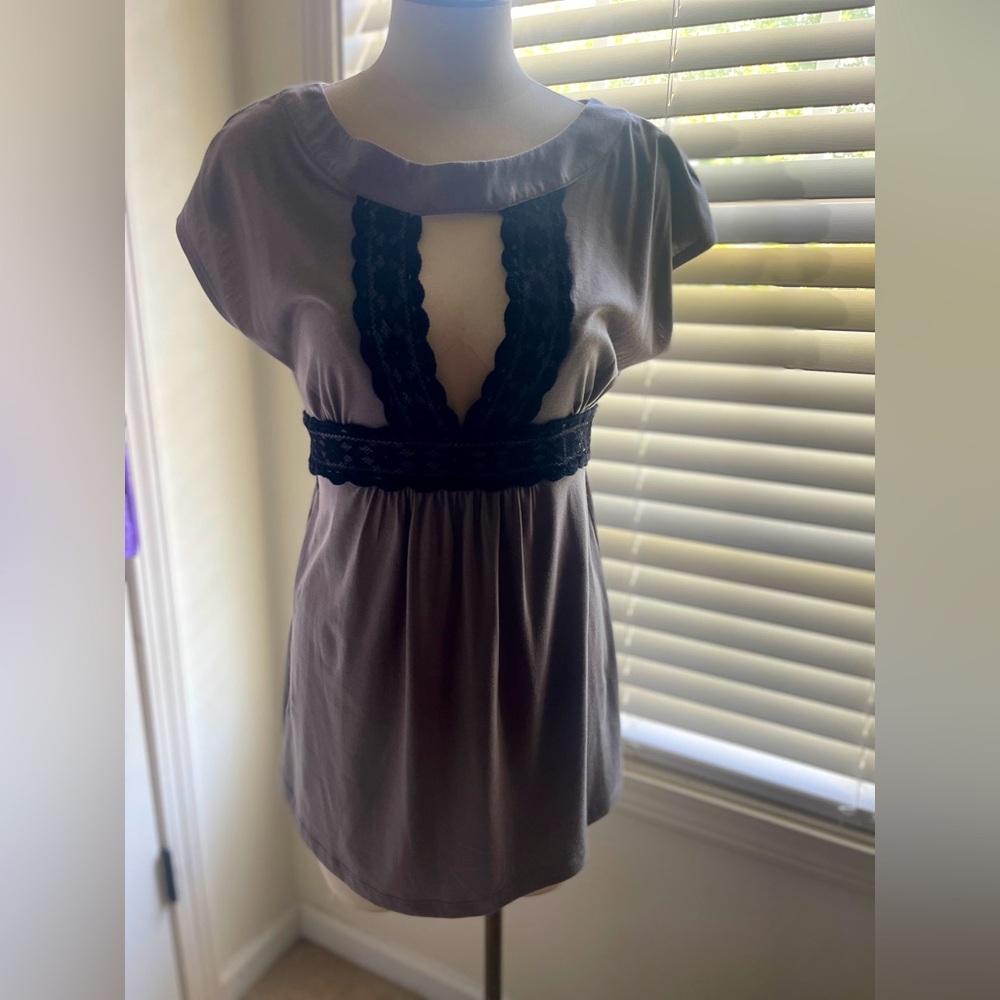Like new condition gray with lace opening tie up in back dressy tank top size:M
